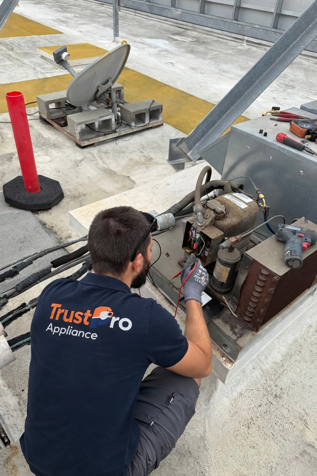 Trust Pro technician servicing Bryant HVAC system
